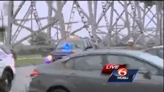 Rail cars from train in Elmwood topple during severe weather