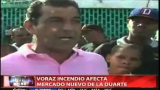 Voraz incendio afecta Mercado Nuevo de la avenida Duarte