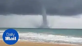 Huge waterspout appears in sea off Spanish city of Valencia - Daily Mail