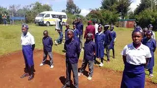BISHOP KIBOI inspecting the guard of honor by AIPCA GATHIRIGA BOYS AND GIRLS BRIGADE 