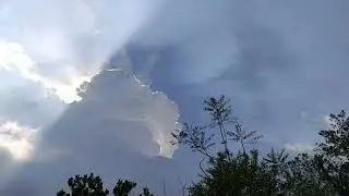 Look up into the sky, beautiful clouds , its a crown flash
