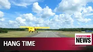 Harlem Globetrotter Bull Bullard makes trick shot from airplane
