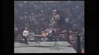Johnny Grunge misses Chris Jericho and crashes through table