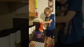 9 year old safely grating cheese