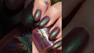 🤎Pariah - a warm brown crelly with a bright green to blue to violet aurora shimmer💜