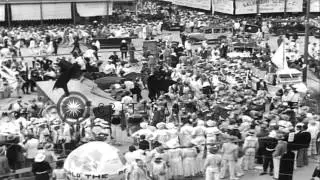 Grotesque figures, decorated floats and typical dances in a parade on a national ...HD Stock Footage