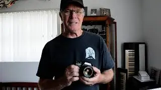 Open stuck battery compartment hatch on your vintage camera