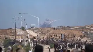 Palestinians describe more chaos trying to collect food from Israeli and US-backed Gaza aid hub