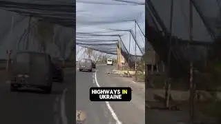 Anti-drone nets hide roads in Ukraine to block drone detection.#Ukraine #DroneWar #Camouflage