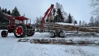 Fyller på stockbordet med Volvo BM Buster 400 & ATV-vagn 