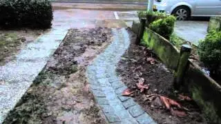 Regenwater bovengronds afgevoerd
