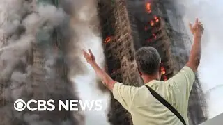 Distraught family members await answers as Hong Kong fire rages on and death toll climbs
