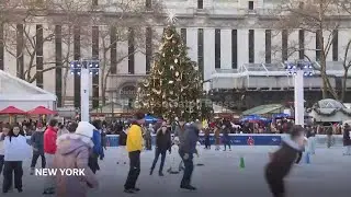 Hundreds visit New York's Bryant Park to ice skate on Christmas Eve