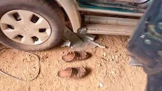 Working of a Toyota Qualis body repairing