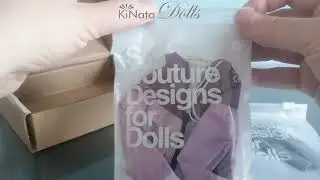 Unboxing. Clothes for doll