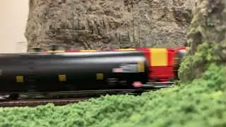 Canadian pacific hauling 101 propane cars pass circus train 