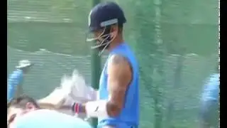 Watch Dhoni Play With His Dogs