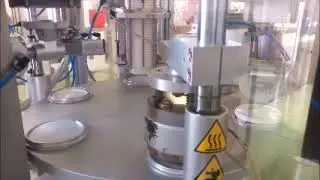 Joghurt Verpackungsmaschine - Jam packaging machine - Dairy packaging machine - Rotopack srl Milano