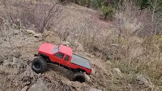 Opening another trail, the Chevy keeps making trail. Proline body, RedCat running gear on crawler