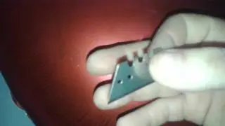 Red heart mylar balloon popping