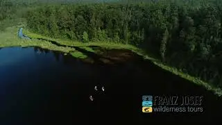 Paddleboards on Lake Mapourika