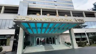 Walking Towards The Scanderbeg Square And Tirana International Hotel.