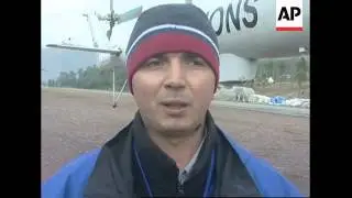 Quake zone aid flights resume as weather improves