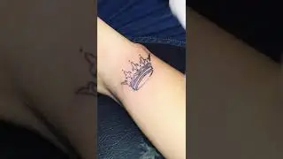 making of small crown tattoo on wrist