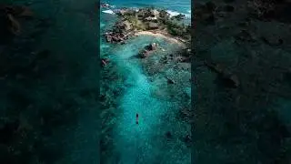 Drone Films Mermaid Swimming Near Abandoned Caribbean Island