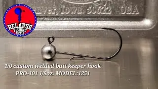Pouring up some custom round-head jigs with bait keeper hooks in a Do-it mold.