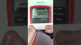 Why do mobile phone batteries have 3 terminals?
