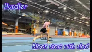 Block start with sled . Hurdler . Низький старт із санчатами .