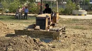 Excavator moving soil