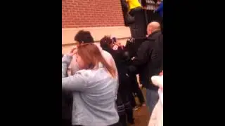 Baltimore Ravens fans climbing stadium gate!