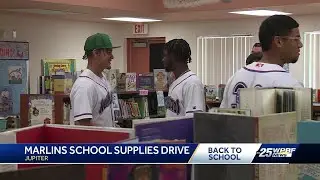 Marlins Organization hands out school supplies to students at Jupiter Elementary