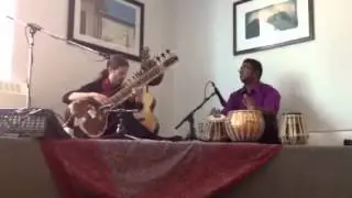 Tabla House Senior Student Ryan Seepersad accompanying Chris Hale