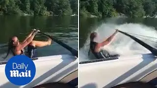 EPIC FAIL! Woman faceplants as she tries to water ski barefoot
