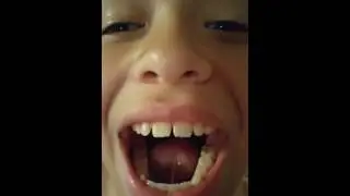 Kid folding his tongue