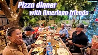 Last meal in Laos, eating dinner with our American friends 