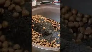 The scent of the Sunday Market! Freshly roasted chestnuts stealing the show in Phuket. 🌰🔥