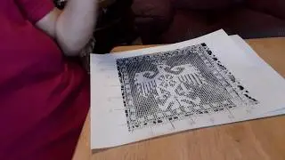 Making a lacis pattern from an extant piece of lacis.