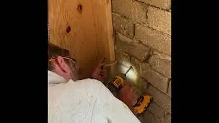 Adding an electrical outlet to a compressed earth block (CEB) wall