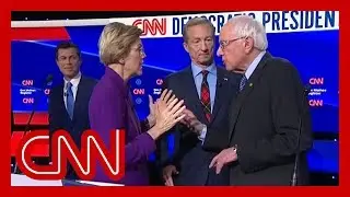 Watch tense exchange between Warren and Sanders after debate