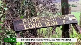 British chalk figure vandalized with face mask