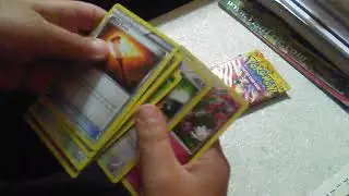 Delphox tin and tomy toy from toys r us