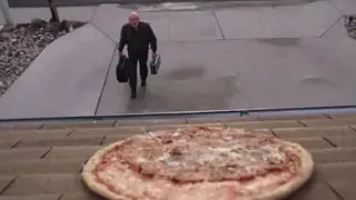 Why is a home in Albuquerque being pelted with pizza?