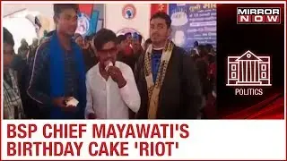 BSP workers fight for cake after celebration of BSP Chief Mayawati's birthday