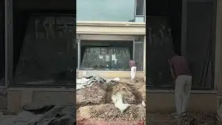 Installing a Large Glass Panel with Teamwork