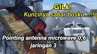 Pointing antenna microwave di atas tower