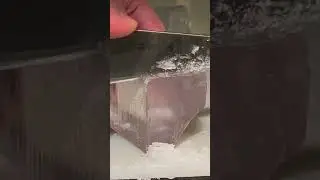 scrape off the opaque edges of the ice cubes to produce clearer, more transparent ice cubes.